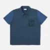 Universal Works Newlyn Polo In Navy O/D Dead Stock Jersey